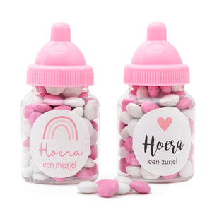 Babyflesje meisje met roze-witte smarties